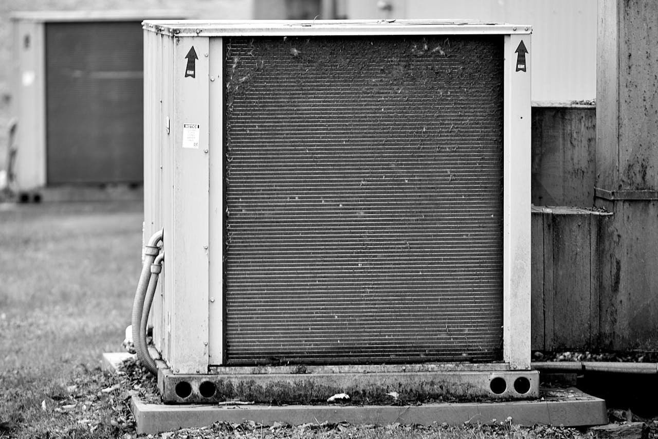 Close-up of an industrial HVAC unit outdoors, showcasing its metal texture.